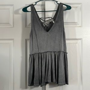 American rag, gray tank top.